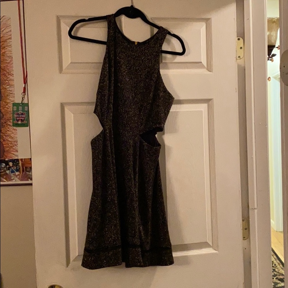 Black and gold sleeveless dress